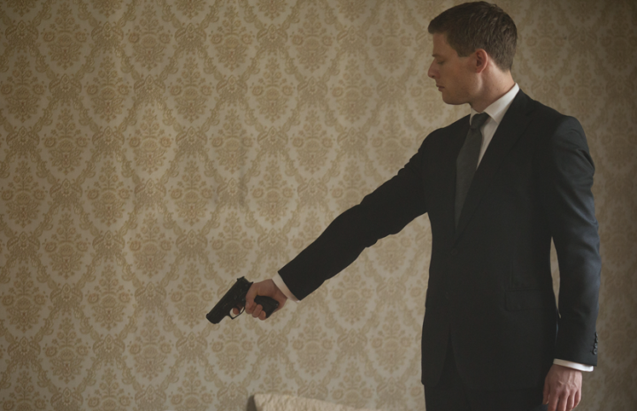 A man holding gun on his hand