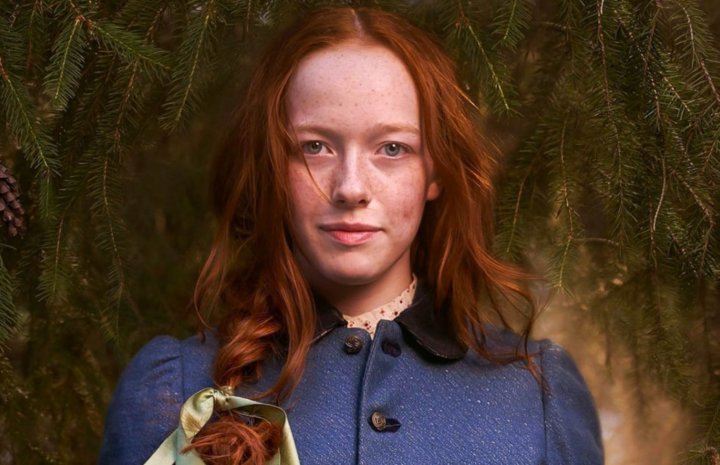 Girl in blue dress with brown hair