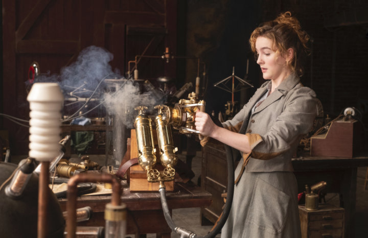 Girl is doing something with machines