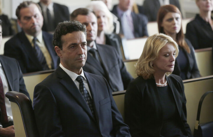 A man and a woman are sitting together